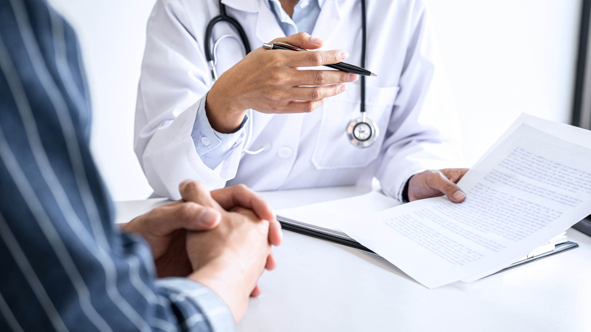 Doctor consulting patient